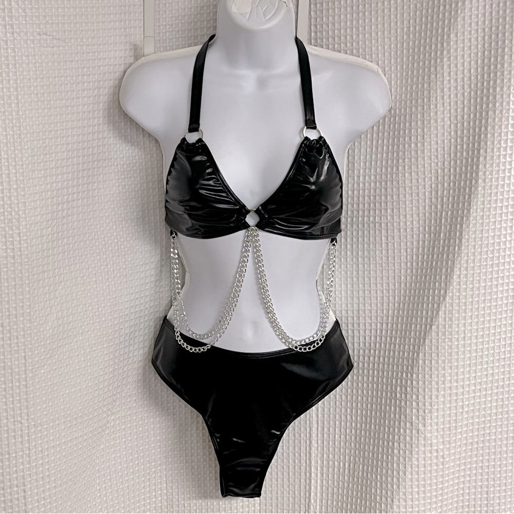 Ladies one piece ring chain hollow out bodysuit size small (Unbranded)